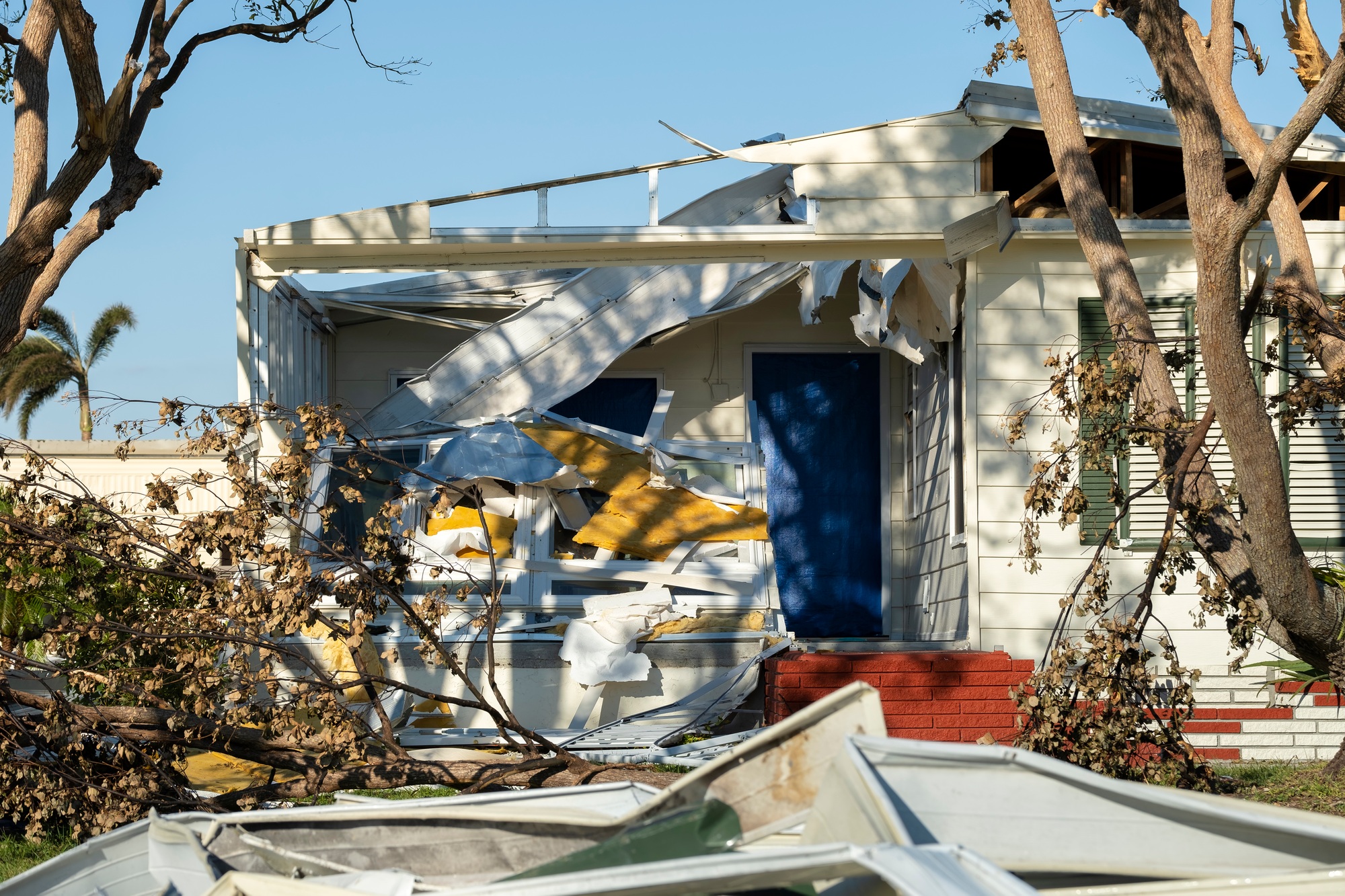 Property damage from strong hurricane winds.